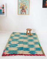 Vintage Turkish rug in living room setting, old rug, antique rug, pastel colors, faded colors, Turkish rug, vintage rug, soft rug, Portland, Oregon, rug store, rug shop, local shop