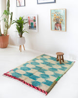 Vintage Turkish rug in living room setting, old rug, antique rug, pastel colors, faded colors, Turkish rug, vintage rug, soft rug, Portland, Oregon, rug store, rug shop, local shop