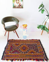 Vintage mini kilim rug in room decor setting, kilim, Turkish rug, vintage rug, portland, rug shop, bright colors, wild shaman, soft rug, bold color, Portland, Oregon, rug store, rug shop, local shop