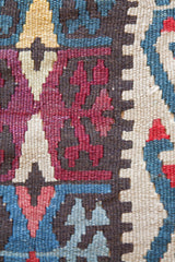 Vintage kilim rug in room decor setting, kilim, Turkish rug, vintage rug, portland, rug shop, bright colors, wild shaman, soft rug, bold color, Portland, Oregon, rug store, rug shop, local shop, antique rug