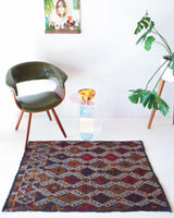 Vintage mini kilim rug in room decor setting, kilim, Turkish rug, vintage rug, portland, rug shop, bright colors, wild shaman, soft rug, bold color, Portland, Oregon, rug store, rug shop, local shop