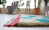 Vintage Turkish rug in living room setting, old rug, antique rug, pastel colors, faded colors, Turkish rug, vintage rug, soft rug, Portland, Oregon, rug store, rug shop, local shop