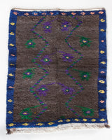 Vintage Turkish rug in a living room setting, pile rug, Turkish rug, vintage rug, portland, rug shop, bright colors, wild shaman, soft rug, bold color, Portland, Oregon, rug store, rug shop, local shop