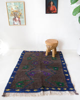 Vintage Turkish rug in a living room setting, pile rug, Turkish rug, vintage rug, portland, rug shop, bright colors, wild shaman, soft rug, bold color, Portland, Oregon, rug store, rug shop, local shop