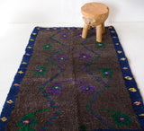 Vintage Turkish rug in a living room setting, pile rug, Turkish rug, vintage rug, portland, rug shop, bright colors, wild shaman, soft rug, bold color, Portland, Oregon, rug store, rug shop, local shop