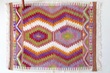 Vintage kilim rug in room decor setting, old rug, antique rug, pastel colors, faded colors, Turkish rug, vintage rug, soft rug, Portland, Oregon, rug store, rug shop, local shop