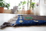 Vintage Turkish rug in a living room setting, pile rug, Turkish rug, vintage rug, portland, rug shop, bright colors, wild shaman, soft rug, bold color, Portland, Oregon, rug store, rug shop, local shop