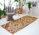 Vintage Turkish runner rug in living room setting, old rug, antique rug, pastel colors, faded colors, Turkish rug, vintage rug, soft rug, Portland, Oregon, rug store, rug shop, local shop