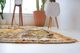 Vintage Turkish runner rug in living room setting, old rug, antique rug, pastel colors, faded colors, Turkish rug, vintage rug, soft rug, Portland, Oregon, rug store, rug shop, local shop