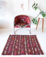 Vintage mini kilim rug in room decor setting, kilim, Turkish rug, vintage rug, portland, rug shop, bright colors, wild shaman, soft rug, bold color, Portland, Oregon, rug store, rug shop, local shop