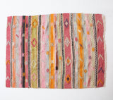 Vintage kilim rug in room decor setting, old rug, antique rug, pastel colors, faded colors, Turkish rug, vintage rug, soft rug, Portland, Oregon, rug store, rug shop, local shop