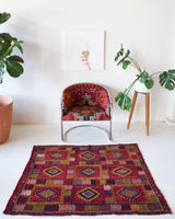 Vintage mini kilim rug in room decor setting, kilim, Turkish rug, vintage rug, portland, rug shop, bright colors, wild shaman, soft rug, bold color, Portland, Oregon, rug store, rug shop, local shop