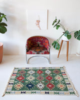 Vintage mini kilim rug in room decor setting, kilim, Turkish rug, vintage rug, portland, rug shop, bright colors, wild shaman, soft rug, bold color, Portland, Oregon, rug store, rug shop, local shop
