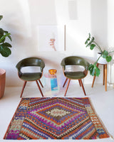 Vintage mini kilim rug in room decor setting, kilim, Turkish rug, vintage rug, portland, rug shop, bright colors, wild shaman, soft rug, bold color, Portland, Oregon, rug store, rug shop, local shop