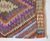 Vintage mini kilim rug in room decor setting, kilim, Turkish rug, vintage rug, portland, rug shop, bright colors, wild shaman, soft rug, bold color, Portland, Oregon, rug store, rug shop, local shop