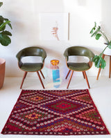 Vintage mini kilim rug in room decor setting, kilim, Turkish rug, vintage rug, portland, rug shop, bright colors, wild shaman, soft rug, bold color, Portland, Oregon, rug store, rug shop, local shop