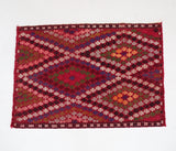 Vintage mini kilim rug in room decor setting, kilim, Turkish rug, vintage rug, portland, rug shop, bright colors, wild shaman, soft rug, bold color, Portland, Oregon, rug store, rug shop, local shop
