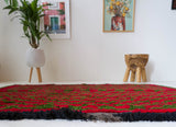 Vintage Turkish rug in a living room setting, pile rug, Turkish rug, vintage rug, portland, rug shop, bright colors, wild shaman, soft rug, bold color, Portland, Oregon, rug store, rug shop, local shop, shag rug, shaggy, plush