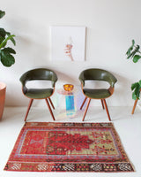 Vintage Turkish mini rug in room decor setting, old rug, antique rug, pastel colors, faded colors, Turkish rug, vintage rug, soft rug, Portland, Oregon, rug store, rug shop, local shop