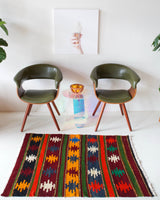 Vintage mini kilim rug in room decor setting, kilim, Turkish rug, vintage rug, portland, rug shop, bright colors, wild shaman, soft rug, bold color, Portland, Oregon, rug store, rug shop, local shop