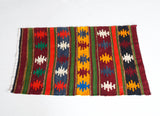 Vintage mini kilim rug in room decor setting, kilim, Turkish rug, vintage rug, portland, rug shop, bright colors, wild shaman, soft rug, bold color, Portland, Oregon, rug store, rug shop, local shop