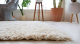 Vintage Turkish rug in a living room setting, pile rug, Turkish rug, vintage rug, portland, rug shop, bright colors, wild shaman, soft rug, bold color, Portland, Oregon, rug store, rug shop, local shop, shag rug, shaggy, plush