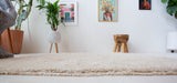 Vintage Turkish rug in a living room setting, pile rug, Turkish rug, vintage rug, portland, rug shop, bright colors, wild shaman, soft rug, bold color, Portland, Oregon, rug store, rug shop, local shop, shag rug, shaggy, plush