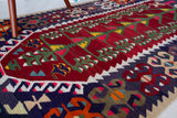Vintage kilim rug in room decor setting, kilim, Turkish rug, vintage rug, portland, rug shop, bright colors, wild shaman, soft rug, bold color, Portland, Oregon, rug store, rug shop, local shop, antique rug