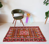 Vintage kilim rug in room decor setting, kilim, Turkish rug, vintage rug, portland, rug shop, bright colors, wild shaman, soft rug, bold color, Portland, Oregon, rug store, rug shop, local shop, antique rug