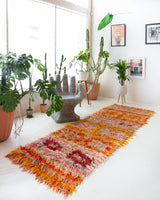 Vintage Turkish runner rug in a living room setting, pile rug, Turkish rug, vintage rug, portland, rug shop, bright colors, wild shaman, soft rug, bold color, Portland, Oregon, rug store, rug shop, local shop, antique rug