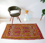 Vintage kilim rug in room decor setting, kilim, Turkish rug, vintage rug, portland, rug shop, bright colors, wild shaman, soft rug, bold color, Portland, Oregon, rug store, rug shop, local shop, antique rug