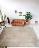 Vintage Turkish rug in living room setting, old rug, antique rug, pastel colors, faded colors, Turkish rug, vintage rug, soft rug, Portland, Oregon, rug store, rug shop, local shop
