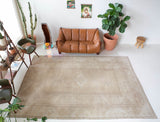 Vintage Turkish rug in living room setting, old rug, antique rug, pastel colors, faded colors, Turkish rug, vintage rug, soft rug, Portland, Oregon, rug store, rug shop, local shop