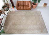 Vintage Turkish rug in living room setting, old rug, antique rug, pastel colors, faded colors, Turkish rug, vintage rug, soft rug, Portland, Oregon, rug store, rug shop, local shop