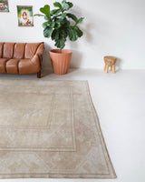Vintage Turkish rug in living room setting, old rug, antique rug, pastel colors, faded colors, Turkish rug, vintage rug, soft rug, Portland, Oregon, rug store, rug shop, local shop