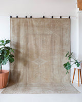 Vintage Turkish rug in living room setting, old rug, antique rug, pastel colors, faded colors, Turkish rug, vintage rug, soft rug, Portland, Oregon, rug store, rug shop, local shop