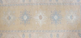 Vintage Turkish rug in living room setting, old rug, antique rug, pastel colors, faded colors, Turkish rug, vintage rug, soft rug, Portland, Oregon, rug store, rug shop, local shop