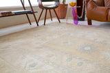 Vintage Turkish rug in living room setting, old rug, antique rug, pastel colors, faded colors, Turkish rug, vintage rug, soft rug, Portland, Oregon, rug store, rug shop, local shop