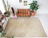 Vintage Turkish rug in living room setting, old rug, antique rug, pastel colors, faded colors, Turkish rug, vintage rug, soft rug, Portland, Oregon, rug store, rug shop, local shop
