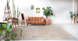 Vintage Turkish rug in living room setting, old rug, antique rug, pastel colors, faded colors, Turkish rug, vintage rug, soft rug, Portland, Oregon, rug store, rug shop, local shopVintage Turkish rug in living room setting, old rug, antique rug, pastel colors, faded colors, Turkish rug, vintage rug, soft rug, Portland, Oregon, rug store, rug shop, local shop
