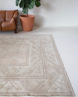 Vintage Turkish rug in living room setting, old rug, antique rug, pastel colors, faded colors, Turkish rug, vintage rug, soft rug, Portland, Oregon, rug store, rug shop, local shop