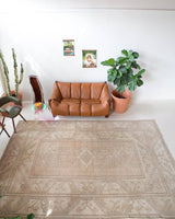 Vintage Turkish rug in living room setting, old rug, antique rug, pastel colors, faded colors, Turkish rug, vintage rug, soft rug, Portland, Oregon, rug store, rug shop, local shop