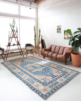 Vintage Turkish rug in living room setting, old rug, antique rug, pastel colors, faded colors, Turkish rug, vintage rug, soft rug, Portland, Oregon, rug store, rug shop, local shop