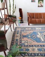 Vintage Turkish rug in living room setting, old rug, antique rug, pastel colors, faded colors, Turkish rug, vintage rug, soft rug, Portland, Oregon, rug store, rug shop, local shop