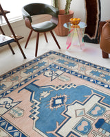 Vintage Turkish rug in living room setting, old rug, antique rug, pastel colors, faded colors, Turkish rug, vintage rug, soft rug, Portland, Oregon, rug store, rug shop, local shop