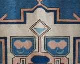 Vintage Turkish rug in living room setting, old rug, antique rug, pastel colors, faded colors, Turkish rug, vintage rug, soft rug, Portland, Oregon, rug store, rug shop, local shop