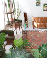 Vintage kilim rug in living room setting, old rug, antique rug, pastel colors, faded colors, Turkish rug, vintage rug, soft rug, Portland, Oregon, rug store, rug shop, local shop