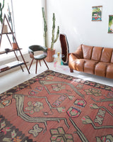 Vintage kilim rug in living room setting, old rug, antique rug, pastel colors, faded colors, Turkish rug, vintage rug, soft rug, Portland, Oregon, rug store, rug shop, local shop