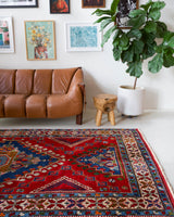 Vintage Turkish rug in a living room setting, pile rug, Turkish rug, vintage rug, portland, rug shop, bright colors, wild shaman, soft rug, bold color, Portland, Oregon, rug store, rug shop, local shop, antique rug
