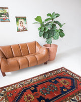 Vintage caucasian rug in a living room setting, pile rug, Turkish rug, vintage rug, portland, rug shop, bright colors, wild shaman, soft rug, bold color, Portland, Oregon, rug store, rug shop, local shop, antique rug